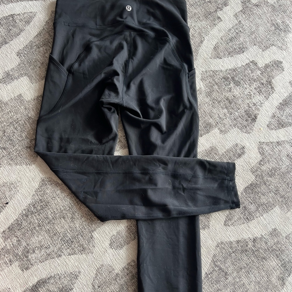 Lululemon black leggings with back pocket and two side pockets